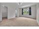 A spacious bedroom with a walk-in closet and large window at 5286 Rustic Ave, Firestone, CO 80504