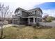 Well-maintained two-story home featuring a neatly landscaped yard, attached garage, and inviting curb appeal at 4307 Beautiful Cir, Castle Rock, CO 80109