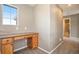 Home office nook features a built-in desk area and natural light, creating a productive workspace within the residence at 4307 Beautiful Cir, Castle Rock, CO 80109