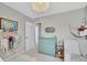 Bright Bedroom features a changing table, rocker, and adorable decorations to create a comfy space at 9749 Meade Cir, Westminster, CO 80031