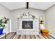 The living room features a stone fireplace and hardwood floors at 9749 Meade Cir, Westminster, CO 80031