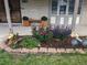 Charming home entrance with beautiful landscaping and decorative welcome bicycle at 9749 Meade Cir, Westminster, CO 80031
