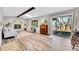 Bright living area features refinished fireplace, vaulted ceilings, with access to back yard at 9749 Meade Cir, Westminster, CO 80031