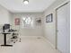 Spacious office features a large window, neutral paint, and sliding door to closet at 9749 Meade Cir, Westminster, CO 80031