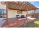 Covered patio featuring patio seating, outdoor lighting and a door that leads into the house at 9749 Meade Cir, Westminster, CO 80031