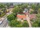 Aerial view of stucco home with a red tile roof with neighborhood views at 1295 S Downing St, Denver, CO 80210