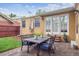 Cozy backyard patio with dining set at 1295 S Downing St, Denver, CO 80210