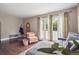 Bright living room with wood floors, stylish furniture, and sun-filled windows at 1295 S Downing St, Denver, CO 80210