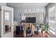 Home office with a glass block window, desk, and an adjustable height chair at 1295 S Downing St, Denver, CO 80210