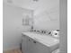 Functional laundry area with washer, dryer, shelving, and bright window at 11935 Riverstone Cir # 6D, Henderson, CO 80640