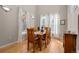 Bright dining room with hardwood floors and large windows at 16355 Flintlock Ct, Parker, CO 80134