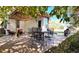 Cozy patio with seating area under a pergola at 16355 Flintlock Ct, Parker, CO 80134