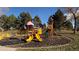 Community playground with slides and climbing structures at 16355 Flintlock Ct, Parker, CO 80134