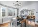 Bright dining room with hardwood floors and view to living room at 2236 Jasmine St, Denver, CO 80207