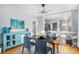 Dining area with modern table and light fixture at 2236 Jasmine St, Denver, CO 80207