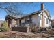 Charming bungalow exterior with brick detailing at 2236 Jasmine St, Denver, CO 80207