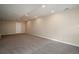 Spacious finished basement with neutral carpeting and recessed lighting at 3272 Brushwood Dr, Castle Rock, CO 80109