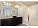 Bathroom with double vanity, shower, and flooring at 3272 Brushwood Dr, Castle Rock, CO 80109