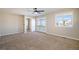 Primary bedroom with balcony access and ceiling fan at 3272 Brushwood Dr, Castle Rock, CO 80109