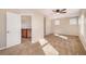 Bright bedroom with carpet, ceiling fan, and upper level access at 3272 Brushwood Dr, Castle Rock, CO 80109