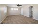 Spacious bedroom with carpeting and access to a bathroom at 3272 Brushwood Dr, Castle Rock, CO 80109