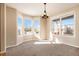 Dining room featuring bay window and hardwood floors at 3272 Brushwood Dr, Castle Rock, CO 80109