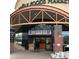 Inviting Whole Foods Market entrance with ample natural light and charming brick details at 7615 E Quincy Ave # 103, Denver, CO 80237