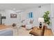 Inviting living room with ample seating and stylish decor at 7615 E Quincy Ave # 103, Denver, CO 80237