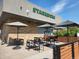 Welcoming Starbucks exterior with outdoor seating and modern design, perfect for a coffee break at 7615 E Quincy Ave # 103, Denver, CO 80237
