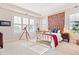 Bright bedroom with large windows and antique furnishings at 2200 S University Blvd # 514, Denver, CO 80210