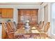 Elegant dining room with hardwood floors, natural light, and stylish decor at 2200 S University Blvd # 514, Denver, CO 80210
