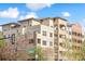 Attractive condo building with a mix of brick and stucco facade at 2200 S University Blvd # 514, Denver, CO 80210