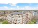 Beautiful exterior of a multi-story condo building with landscaped surroundings on a sunny day at 2200 S University Blvd # 514, Denver, CO 80210