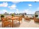 Expansive rooftop terrace with dining and lounge areas at 2200 S University Blvd # 514, Denver, CO 80210