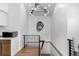 Modern staircase with metal railing and a contemporary light fixture at 5454 Clay St, Denver, CO 80221