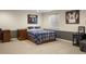 Comfortable bedroom includes a large bed, side tables, and attractive wall decor for a relaxing retreat at 7836 S Fairfax Ct, Centennial, CO 80122