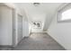 Bedroom featuring carpeted floors, neutral paint, and closet at 3640 Elm St, Denver, CO 80207