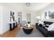 Inviting living room with sofa, stylish decor, and hardwood floors at 3640 Elm St, Denver, CO 80207