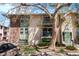 Inviting multi-Gathering exterior showcasing balconies, manicured landscaping, and a convenient parking area at 12151 Melody Dr # 202, Westminster, CO 80234