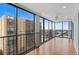 Open-air balcony with panoramic city views, surrounded by black metal railing at 7877 E Mississippi Ave # 1107, Denver, CO 80247