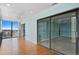 Spacious balcony with wood floors and sliding glass doors with expansive views at 7877 E Mississippi Ave # 1107, Denver, CO 80247