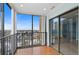 Balcony with scenic views of the city and surrounding landscape through sliding doors at 7877 E Mississippi Ave # 1107, Denver, CO 80247