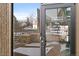 Glass door of the clubhouse, listing amenities like pool, hot tub, and sauna at 7877 E Mississippi Ave # 1107, Denver, CO 80247