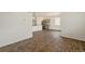 Stylish kitchen and dining area with stainless steel appliances, island seating, and lots of natural light at 845 Leeward St, Lochbuie, CO 80603