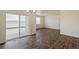 Open living area with sliding glass doors to outside, seamlessly blending indoor and outdoor living spaces at 845 Leeward St, Lochbuie, CO 80603