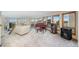 Spacious upper level with a piano and expansive windows with natural light and views at 10592 Raven Run, Littleton, CO 80125