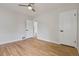 This bedroom features hardwood floors and two closets at 2709 S Franklin St, Denver, CO 80210