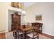 Elegant dining room with hardwood floors, chandelier, and space for a large table at 87 Canongate Ln, Highlands Ranch, CO 80130