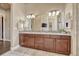 Bathroom features a large double vanity, tile flooring, and ample cabinet space at 416 Galaxy Dr, Castle Rock, CO 80108