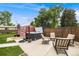 Private backyard featuring a hot tub, storage shed, and comfortable outdoor seating at 245 Main St, Broomfield, CO 80020